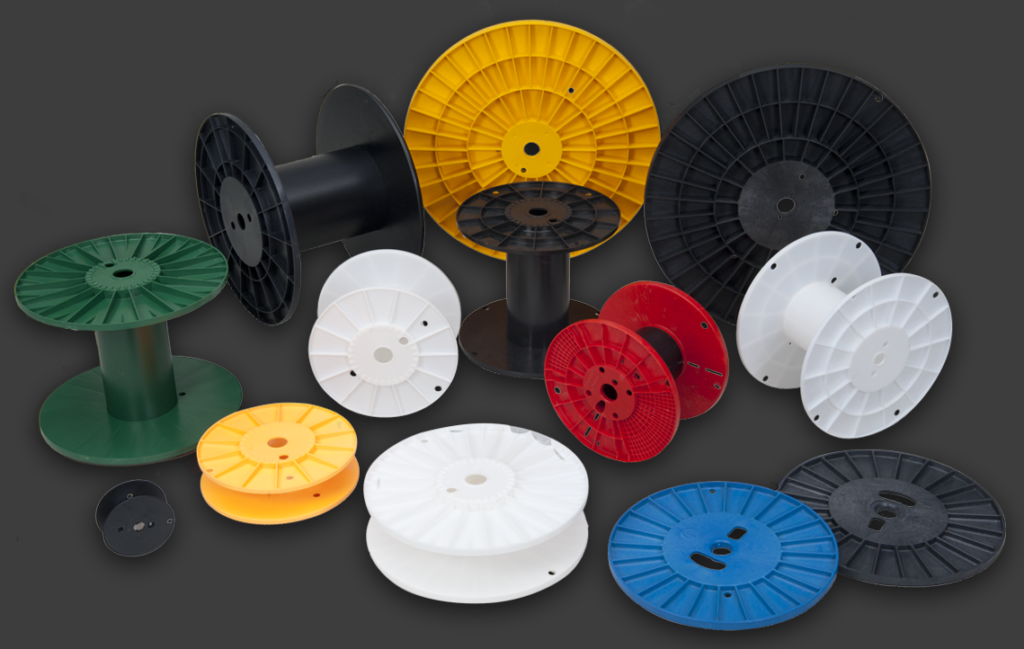 https://www.mossbergind.com/wp-content/uploads/2017/04/plastic-reels-and-spools1139-1024x649.png